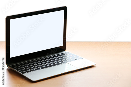 Mock up Laptop computer on the desk
White background
