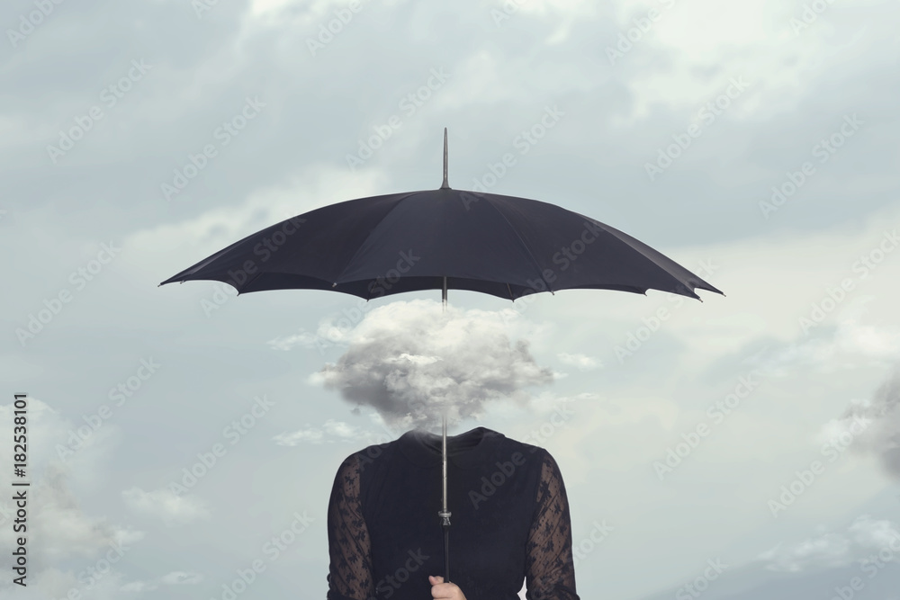 Fototapeta elegant woman with cloud head sheltering herself from the rain with umbrella