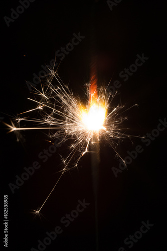 Sparks of Bengal fire on a black background
