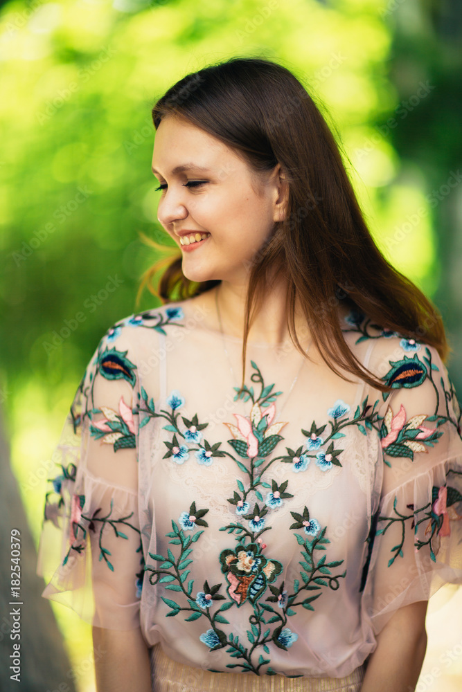 Beautiful young girl on a nature background Beautiful young girl on a nature background