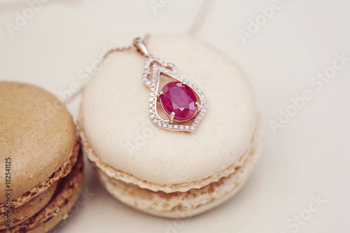 Luxury necklace pendant on sweet little macaron