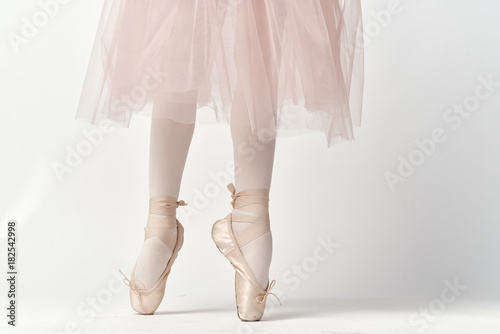 a pack and pointes of a young ballerina close-up