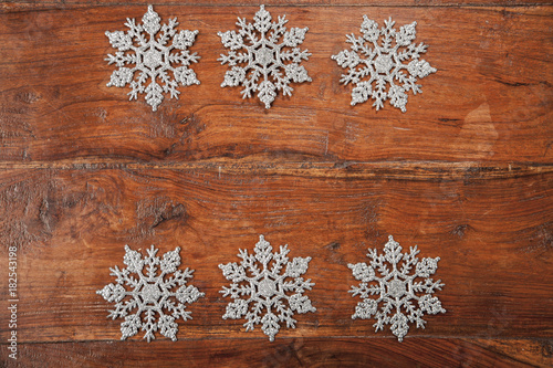 snowflakes on wood, copy space 
