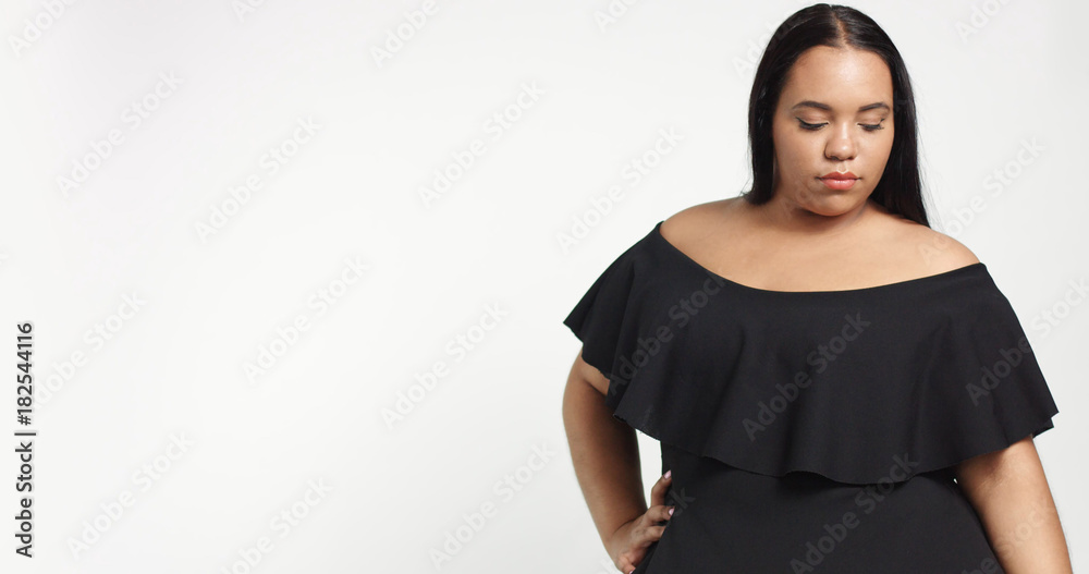 Plus size model in studio shoot happy smiling Plus size model in studio shoot happy smiling