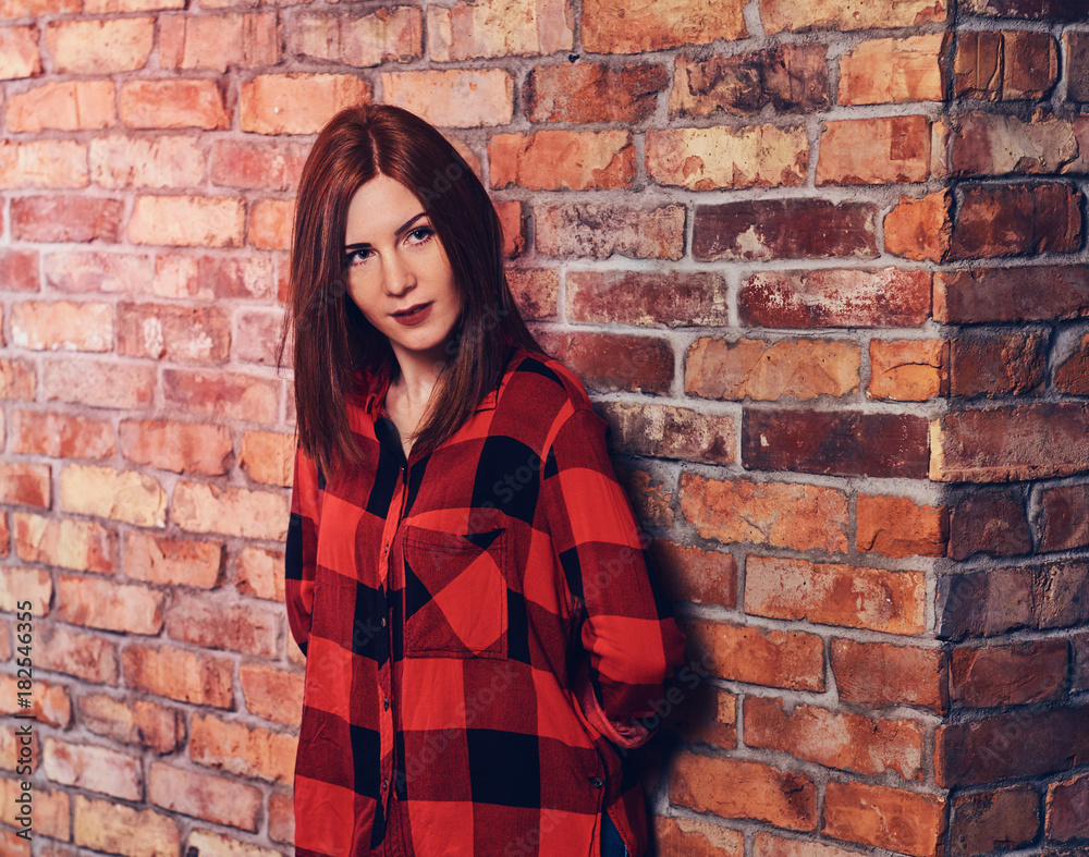 Redhead female in fleece shirt. Redhead female in fleece shirt.