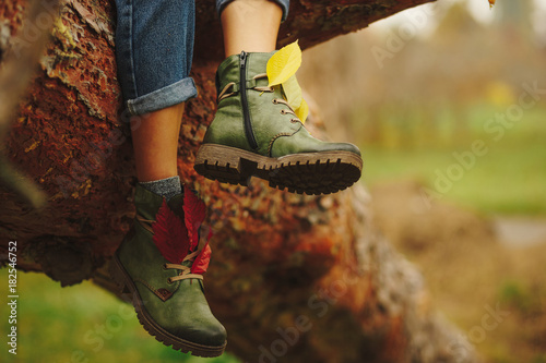 Green leather boots on women legs