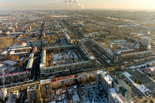 Tyumen  Russia - November 10  2015  Aerial view on residential districts with TV towers and city power factory at background