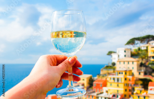 Concepts of drinking wine with a beautiful view of the sea. colorful background