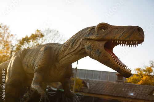 Tyrannosaurus  prehistoric era dinosaur showing his toothy mouth