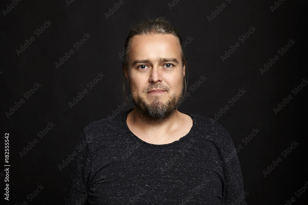 Portrait of Man on Black Background