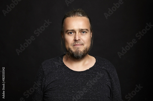 Portrait of Man on Black Background
