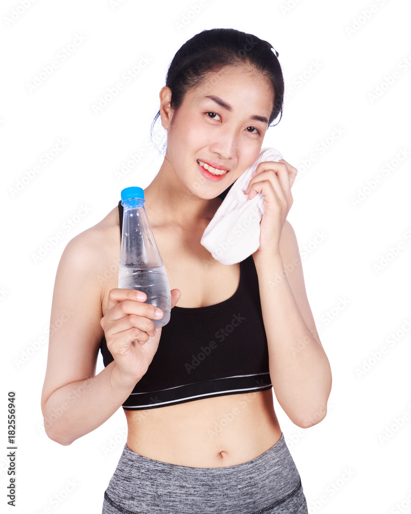 sporty woman with towel and water bottle isolated on white background sporty woman with towel and water bottle isolated on white background