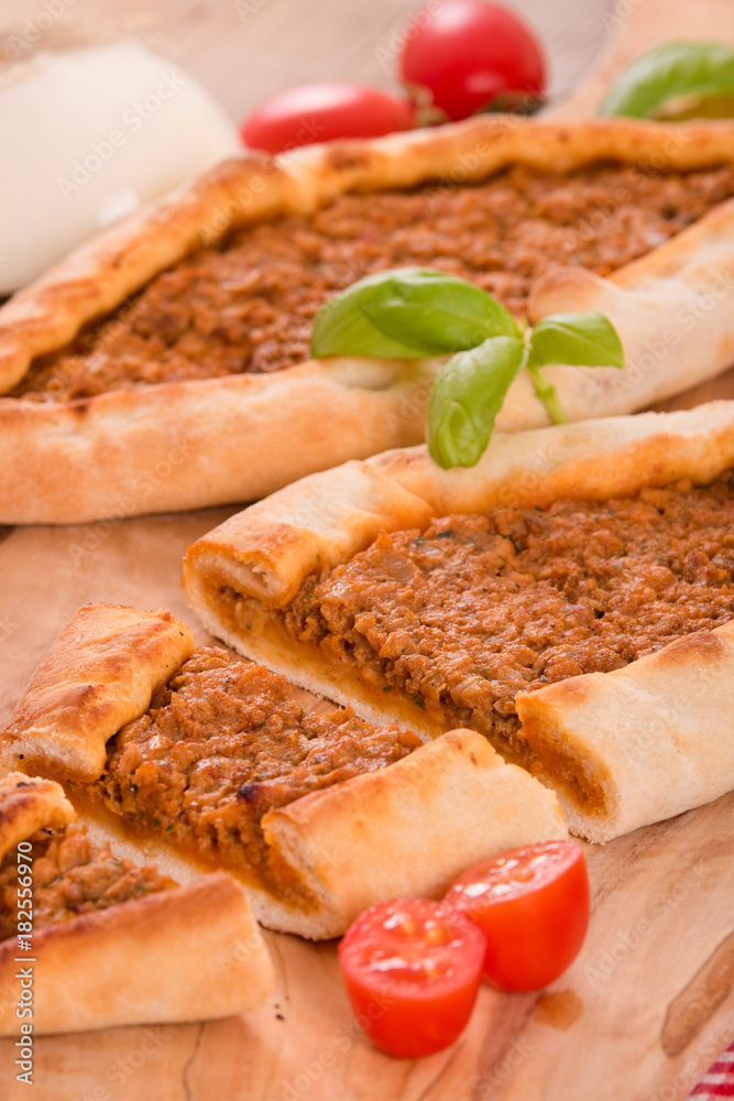 Turkish pide pizza with meat and onion. Turkish pide pizza with meat and onion.