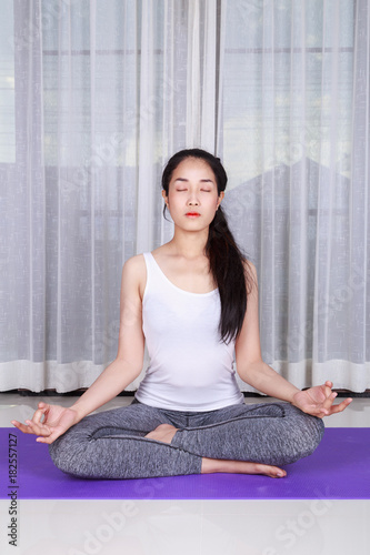 woman doing yoga exercise isolated on white background