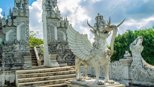 Lembuswana statue, Kutai's mythology animal who has head of lion with crown, elephant trunk, fish scales, and eagle wings in Hindus style temple, Pulau Kumala, Tenggarong, Indonesia photo