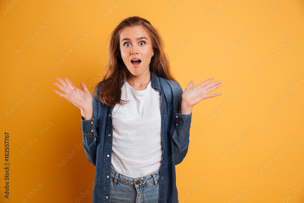 Portrait of an excited pretty girl looking at camera Portrait of an excited pretty girl looking at camera