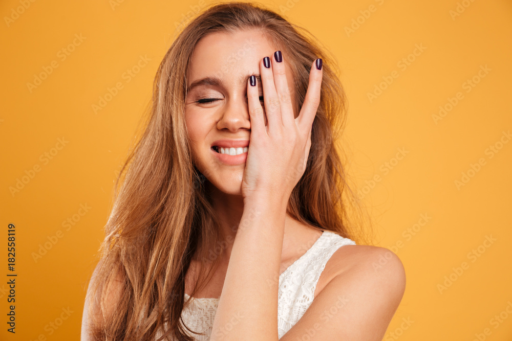Close up portrait of a pretty smiling girl laughing