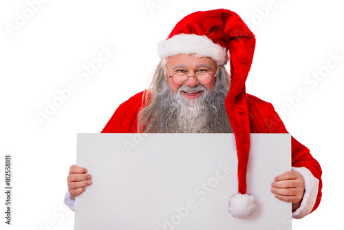 Weihnachtsmann hält Schild in den Händen © DoraZett