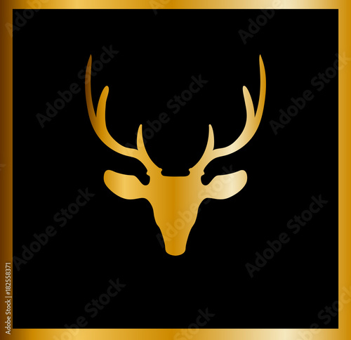 Golden silhouette of reindeer head on black background framed with golden border.