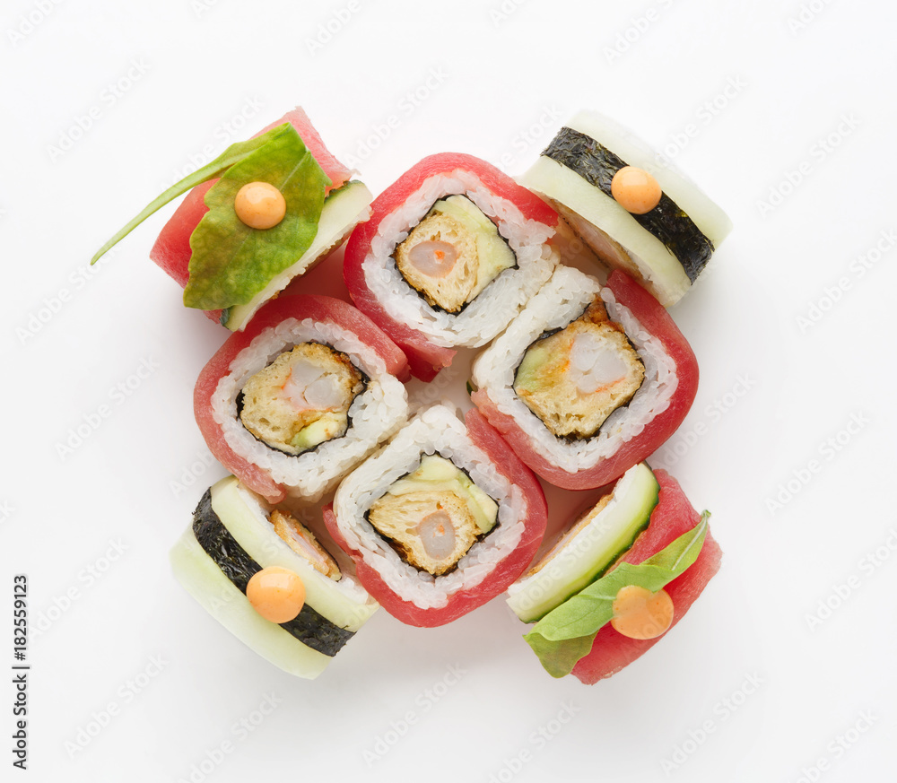 Set of fish rolls isolated on white, closeup Set of fish rolls isolated on white, closeup