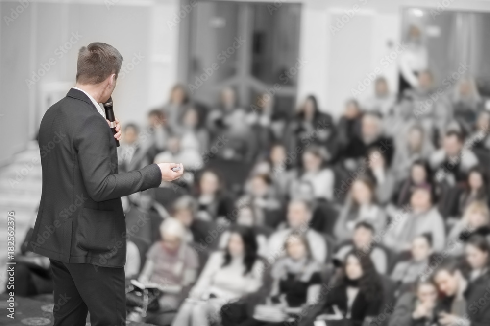 speaker conducts the business conference for journalists and aspiring entrepreneurs