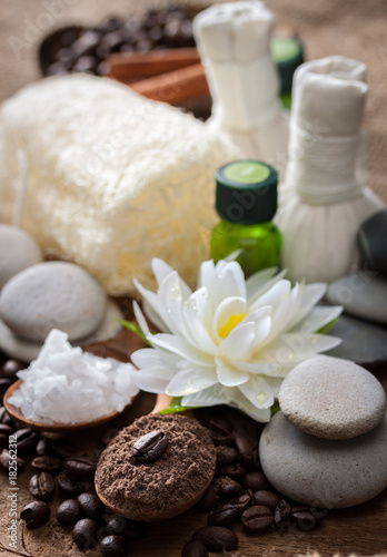 Coffee powder and salt scrub, spa and massage objects, wellness and relaxation concept