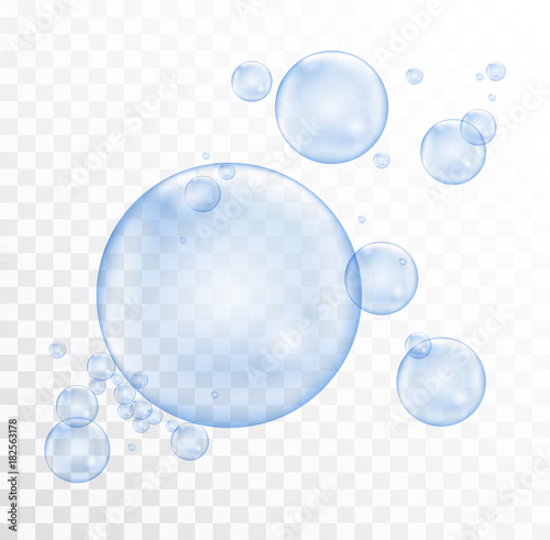 Group of blue realistic shiny flying soap bubbles isolated on transparent background