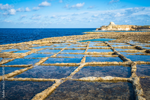 Salt evaporation ponds on Gozo island, Malta photo
