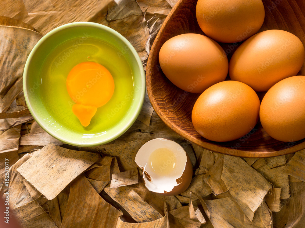 Organic eggs on dried leaf Organic eggs on dried leaf