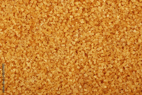 Close up background of brown cane sugar