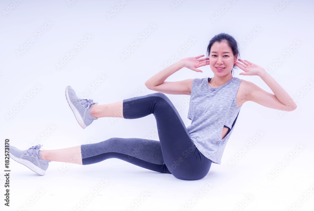 Fitness woman doing fitness position exercises. Photo of woman in silhouette on white background. Fitness and healthy lifestyle concept