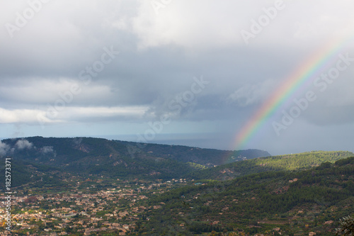 Rainbow over Soller Valley surrounded by the Serra de  Tramuntana  mountains. Majorca  Spain