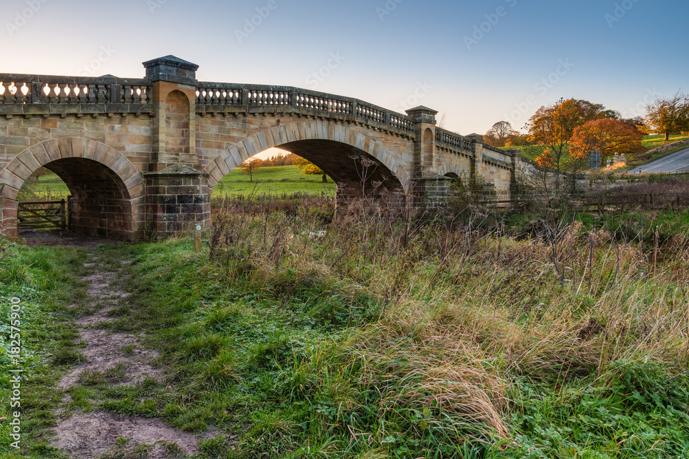Fototapeta premium Wallington Road Bridge / The River Wansbeck rises in the Northumberland hills above Sweethope Lough, then journeys towards the North Sea near Newbiggin