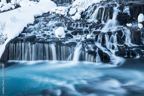 Hraunfossar waterfall in wi...
