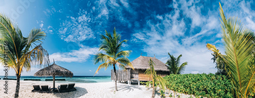 Tropical view of exotic resort island on Maldives