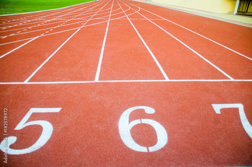 Athletic track with white lane number.