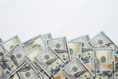 Pile of one hundred US Dollar Bills money isolated on white background with copy space for your text.