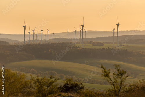 Landscape with Wind turbine in sundown