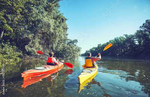 Canvas Print A canoe trip on the river in the summer.