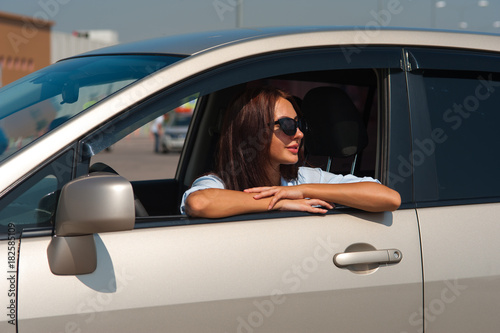 Beautiful business woman in sunglasses in the car © pavel_shishkin