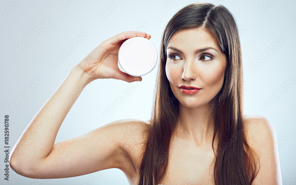 Young woman beauty style portrait with jar face cream. Young woman beauty style portrait with jar face cream.