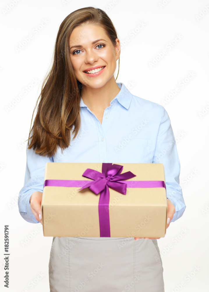 Happy woman holding paper gift box with violet ribbon. Happy woman holding paper gift box with violet ribbon.