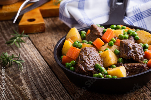 Beef and vegetable stew with potatoes photo