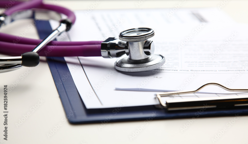 Closeup of medical stethoscope on a rx prescription Closeup of medical stethoscope on a rx prescription