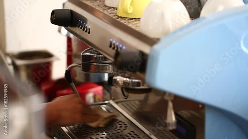 machine brewing a coffee.