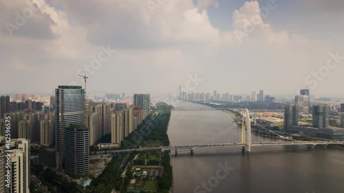 day time guangzhou bridge pearl river haixinsha island park aerial panorama 4k timelapse china
 photo