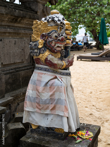 Closeup of traditional Balinese statue in Central Bali temple. Indonesia, autumn, 2017 photo