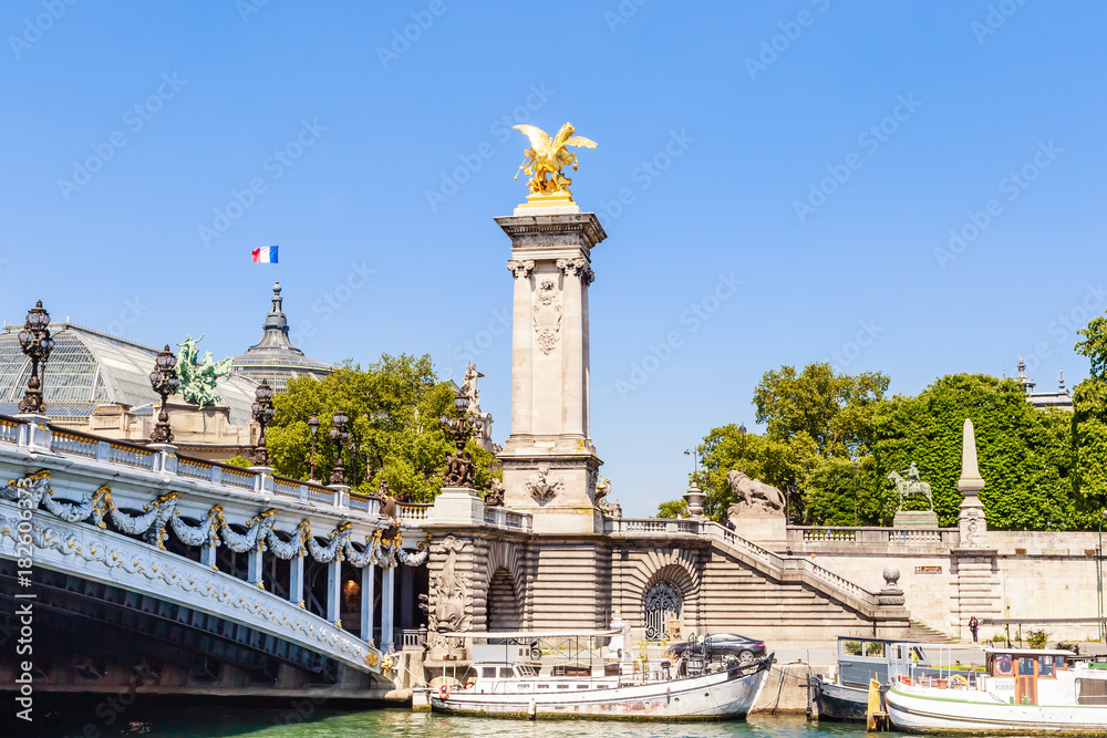 The Alexander III Bridge across the Seine in Paris, France. View from the water