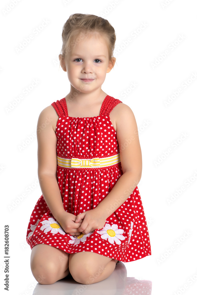 Little girl is sitting on the floor. Little girl is sitting on the floor.