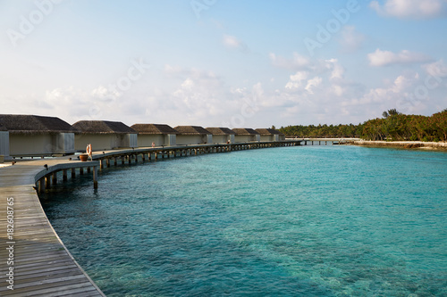 Wallpaper Mural Water bungalows in hotel on Maldives. Villas on Indian ocean at luxury spa resort. Torontodigital.ca